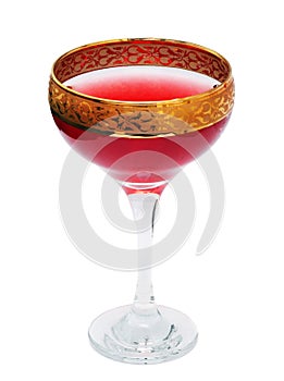 Gold plated elegant crystal clear glass, with red wine inside