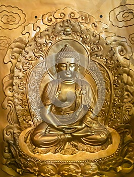 Gold plated image in wall of Buddha at Chua An Long Pagoda, Da Nang Vietnam