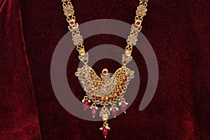 Gold plated jewelry - Fancy Designer golden heavy neck-set closeup macro image