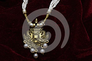 Gold plated jewelry -Fancy Designer golden long neck-set closeup macro image