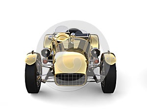 Gold plated vintage sport open wheel racing car - front view