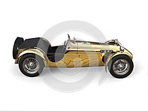 Gold plated vintage sport open wheel racing car - side view