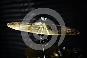 Gold plates from the drum set in the recording Studio. Professional drummers play recording