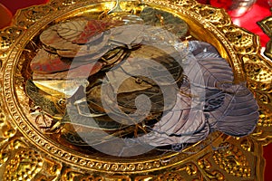 Gold plates used for Chinese New Year ornament in Bangkok, Thailand