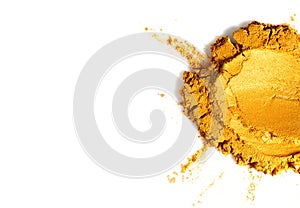Gold powder isolated on white background. Golden metallic dry paint border design, closeup