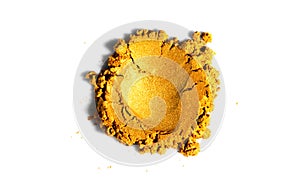 Gold powder isolated on white background. Golden metallic dry paint rotating, close up