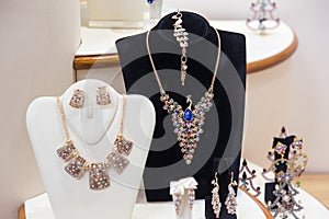 Gold and precious stones jewelry