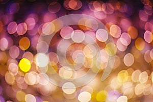 Gold and purple abstract bokeh background glittering stars for c