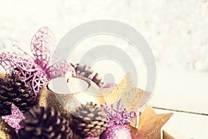 Gold and purple Christmas toys on silver bokeh holiday background