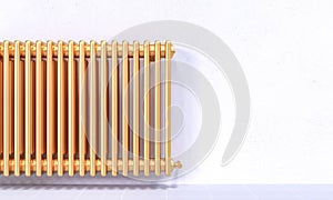 Gold radiator and white wall