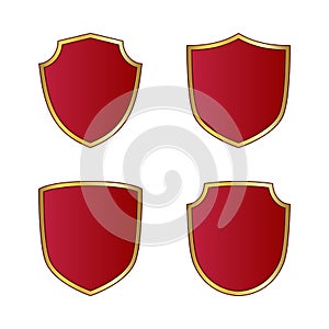 Gold and red shield shape icons set. Logo emblem metallic signs isolated on white background. Shape shield symbol of