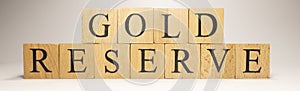Gold reserve name was created from wooden letter cubes. Economics and finance.