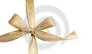 Gold ribbon bow isolated on white background, shiny christmas gifts decoration.