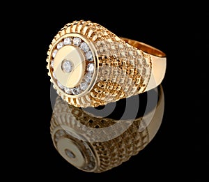 Gold ring with brilliants on black