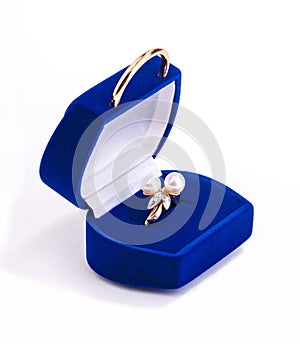 Gold ring with pearls in gift box
