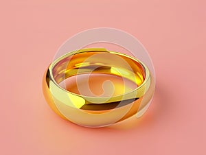 Gold ring on pink background