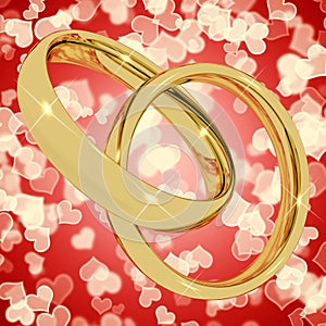 Gold Rings On Heart Bokeh Background