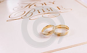 Gold rings wedding bible white book religion