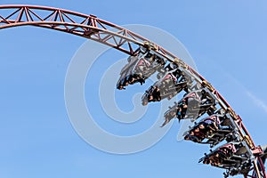 Gold Rush roller coaster, people upside down in the car in Slagharen attraction park.
