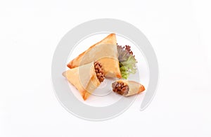 Gold samosa stuffed Meat on white background