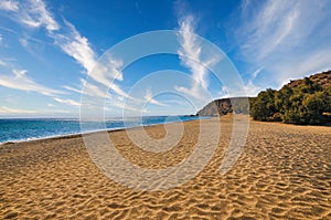 Gold sand in Roukounas beach Anafi