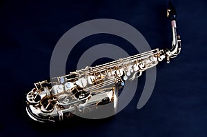 Gold Saxophone Isolated on Black Bk