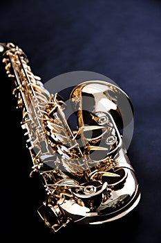 Gold Saxophone Isolated on Black Bk