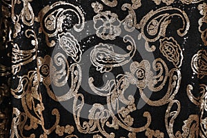 Gold sequin fabric with vintage designs