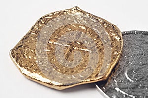 Gold silver 19th century doubloons isolated on white.