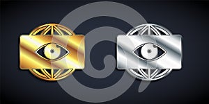 Gold and silver Big brother electronic eye icon isolated on black background. Global surveillance technology, computer