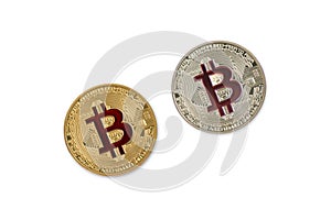 Gold and silver bitcoin coins on a white background. Digital cur