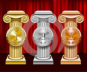 Gold, silver and bronze ancient columns and round medals with la