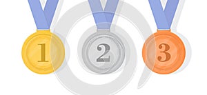 Gold, silver and bronze award medals with ribbons. First, second