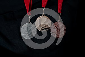 Gold, silver and bronze medals with numbers