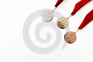 Gold, silver and bronze medals with numbers on white isolated background