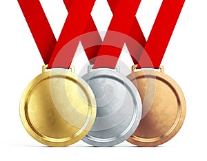 Gold, silver and bronze medals with red ribbons on white background