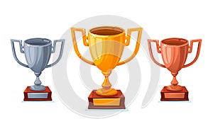 Gold, silver and bronze trophy cup in sartoon style. Winner cups isolated on white background 1st, 2nd, 3rd place.