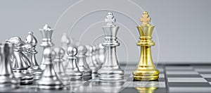 Gold and silver Chess King fgure on Chessboard against opponent or enemy. Strategy, Conflict, management, business planning,