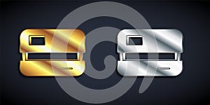 Gold and silver Credit card icon isolated on black background. Online payment. Cash withdrawal. Financial operations