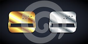 Gold and silver Credit card icon isolated on black background. Online payment. Cash withdrawal. Financial operations