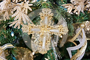 Gold and silver cross ornament