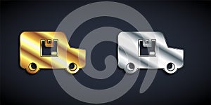Gold and silver Delivery cargo truck vehicle icon isolated on black background. Long shadow style. Vector