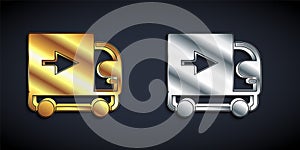 Gold and silver Delivery cargo truck vehicle icon isolated on black background. Long shadow style. Vector