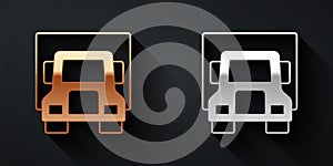 Gold and silver Delivery cargo truck vehicle icon isolated on black background. Long shadow style. Vector