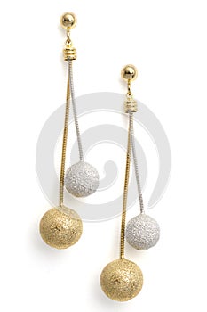 Gold and silver earrings with Briliant isolated on white
