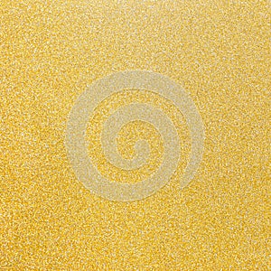 Gold and silver glitter texture background of golden yellow hot foil leaf bright metallic Christmas holiday decoration backdrop