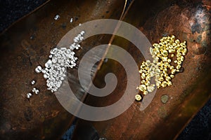 Gold and silver granules in copper shells for melting an alloy i