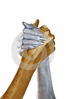 Gold and silver hands joined