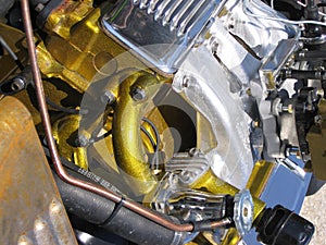 Gold and silver hot rod engine