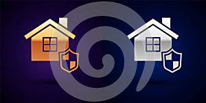 Gold and silver House with shield icon isolated on black background. Insurance concept. Security, safety, protection